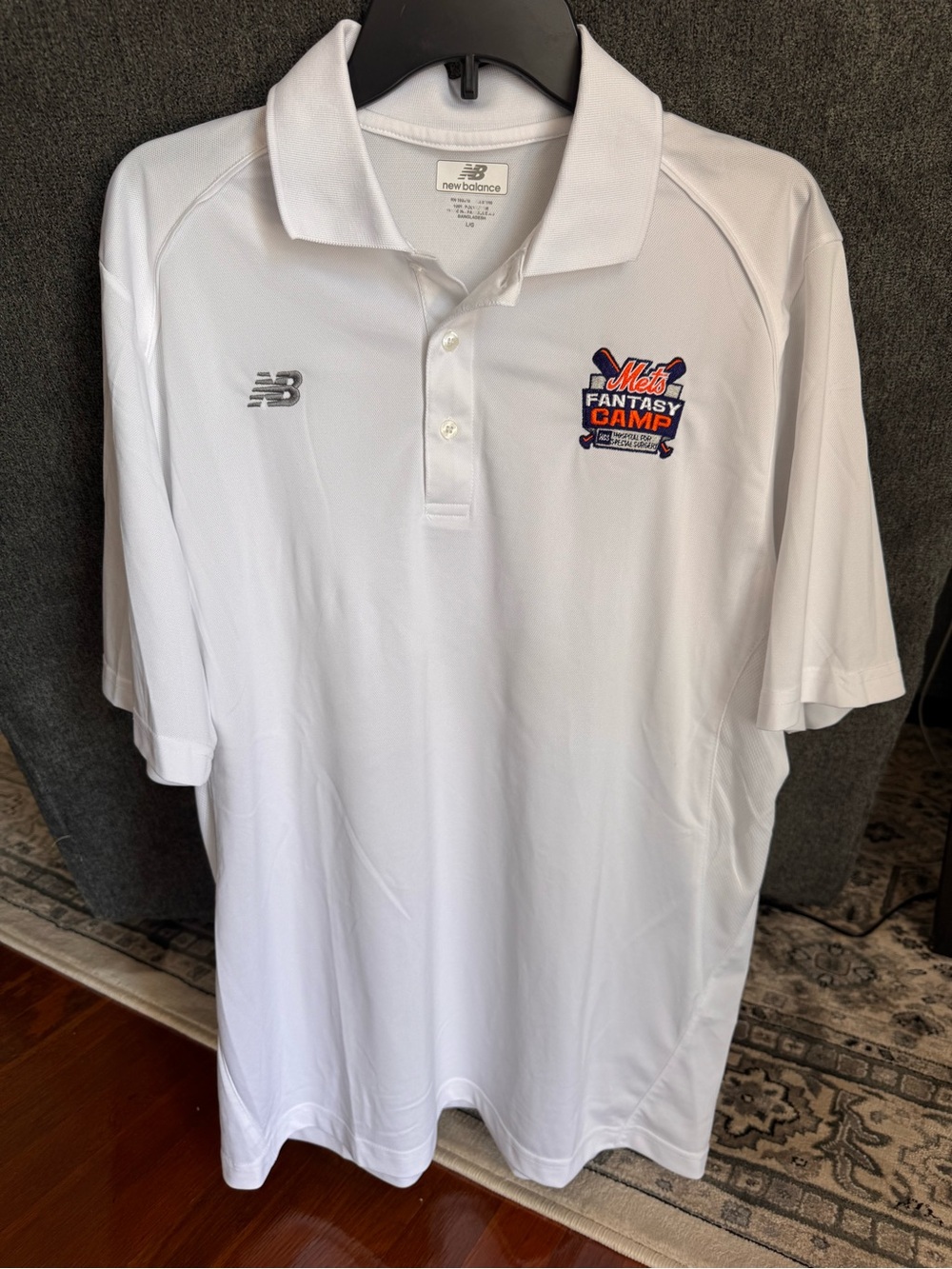 New Balance Men’s White Polo with Mets Fantasy Camp Logo.  LG